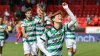 Celtic celebrate victory at Pittodrie (Steve Welsh/PA)