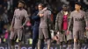 Tottenham’s Davinson Sanchez is consoled by manager Ange Postecoglou after the Carabao Cup second round defeat to Fulham (Jo