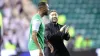 Lee Johnson (right) and Jordan Obita at full-time of Hibernian’s European victory (Steve Welsh/PA)