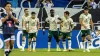 Elie Youan, centre, celebrates his goal in Switzerland (Urs Flueeler/Keystone via AP)