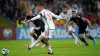 Wales’ Aaron Ramsey scores his side’s opener against Latvia (Tim Goode/PA)