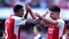 Arsenal’s Declan Rice (right) and team-mate Gabriel celebrate their win over Manchester United (John Walton/PA)