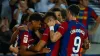 Barcelona players celebrate after Sergio Ramos’ own goal (Joan Monfort/AP)