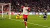 Bayern Munich’s Mathys Tel celebrates scoring the fourth goal against Manchester United (Nick Potts/PA)