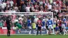 Everton goalkeeper Jordan Pickford makes a save late in the game (Danny Lawson/PA)