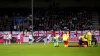 England players look on as Alex Greenwood receives medical attention on the field (Rene Nijhuis/PA)