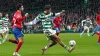 Celtic’s Matt O’Riley in action against Atletico Madrid (Andrew Milligan/PA)