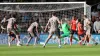 Micky van de Ven (right) scores the winner for Tottenham at Luton (Bradley Collyer/PA)