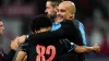 Pep Guardiola embraces Rico Lewis (Nick Potts/PA)