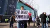 A fan made a banner in tribute to Charlton (Martin Rickett/PA)