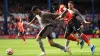 Tottenham vice-captain Cristian Romero (left) has been hailed by fellow defenders Micky van de Ven and Destiny Udogie (Bradl