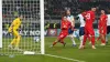 Jani Atanasov, centre, scored an own goal under pressure from Harry Kane (Nick Potts/PA)