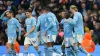 Manchester City’s Jeremy Doku (second right) celebrates scoring their side’s third goal (Mike Egerton/PA)