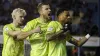 Delano Burgzorg celebrates after scoring Huddersfield’s equaliser at Millwall (Ben Whitley/PA)