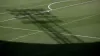 The shadow of a floodlight on the pitch at the Keepmoat Stadium