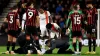 Luton’s Tom Lockyer receives treatment on the pitch during the Premier League match at Bournemouth (Steven Paston/PA).