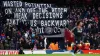 Crystal Palace fans unveil a banner in the stands (Zac Goodwin/PA)