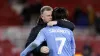 Coventry manager Mark Robins greets two-goal hero Tatsuhiro Sakamoto (Richard Sellers/PA)