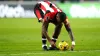 Ivan Toney moves the vanishing spray and ball before scoring his free-kick against Forest (Nick Potts/PA)