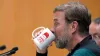 Liverpool manager Jurgen Klopp using a mug with The Normal One on it during a press conference as part of a media day at the