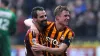 Filipe Morais, left, celebrates with Stephen Darby at the final whistle (Anna Gowthorpe/PA)