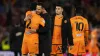 Hull manager Liam Rosenior, centre left, embraces captain Lewie Coyle at full-time (Adam Davy/PA)