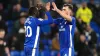 Famara Diedhiou (left) celebrates with Dimitrios Goutas after scoring Cardiff’s winner against Huddersfield (David Davies/PA