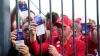 Liverpool fans were kept penned against perimeter fences in the build-up to the 2022 Champions League final in Paris (Adam D