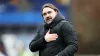 Leeds manager Daniel Farke acknowledges the fans after a draw at Huddersfield (Jess Hornby/PA)