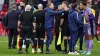 Referee Paul Tierney is surrouned by Nottingham Forest players and staff (Mike Egerton/PA).