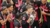 Bayer Leverkusen midfielder Florian Wirtz kisses the Bundesliga trophy after a 2-1 win over Augsburg (Michael Probst/AP/PA)