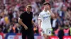 Daniel Farke with dejected Leeds player Archie Gray after defeat at Wembley (Adam Davy/PA)
