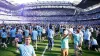 Manchester City fans invade the pitch after seeing their team clinch a fourth successive Premier League title (Martin Ricket