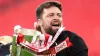 Southampton manager Russell Martin celebrates his side’s promotion after beating Leeds in the play-off final (Adam Davy/PA)