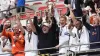 Bromley manager Andy Woodman (centre) celebrates promotion to Sky Bet League Two at Wembley (Nick Potts/PA)