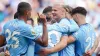 Erling Haaland celebrates with team-mates after scoring City’s fourth goal (Peter Byrne/PA)