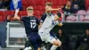 Copenhagen’s Mohamed Elyounoussi, centre, and Kilmarnock’s David Watson challenge for the ball (Liselotte Sabroe/Ritzau Scan