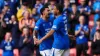 Rangers’ Cyriel Dessers (right) celebrates scoring one of his two goals against Ross County (Andrew Milligan/PA)