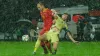 Ben Davies (right) battles with Vladimir Jovovic during Wales’ 2-1 Nations League win in Montenegro on Monday (Risto Bozovic