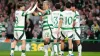 Daizen Maeda (centre) celebrates with team-mates after scoring Celtic’s fourth goal (Andrew Milligan/PA)