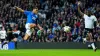 Cyriel Dessers leaps to volley in Rangers’ third goal against Dundee (Jane Barlow/PA)