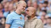 Manchester City’s Erling Haaland (left) is substituted and embraces manager Pep Guardiola during the Premier League match at