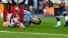 Rodri goes down in pain after suffering a knee injury (Martin Rickett/PA)