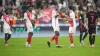 Monaco players celebrate at the end of the Champions League game against Barcelona (Laurent Cipriani/AP)