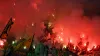 Celtic fans with flares during the Champions League match at Signal Iduna Park (PA Wire via DPA)