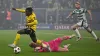 Dortmund’s Jamie Gittens was brought down by Kasper Schmeichel ahead of the early opener (PA Wire via DPA)