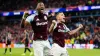 Jhon Duran (left) and Lucas Digne celebrate at the full-time whistle (David Davies/PA)