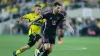 Columbus Crew’s Alexandru Matan, left, chases Inter Miami’s Lionel Messi (Jay LaPrete/AP)