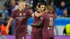 Ilkay Gundogan, centre, celebrates after scoring Manchester City’s opener (Petr Josek/AP)