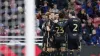 Bobby Thomas (obscured) is congratulated by his team-mates after scoring the opener (Richard Sellers/PA)